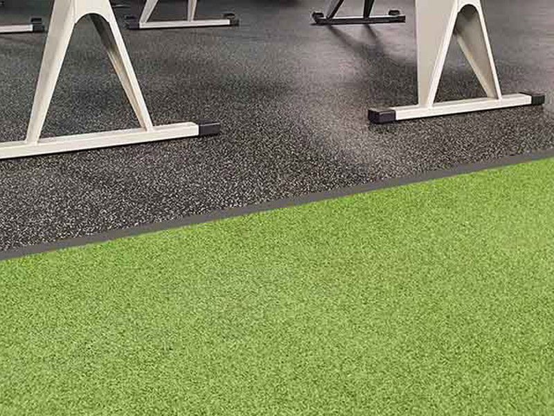 Sled run in gym with acoustic flooring system installed